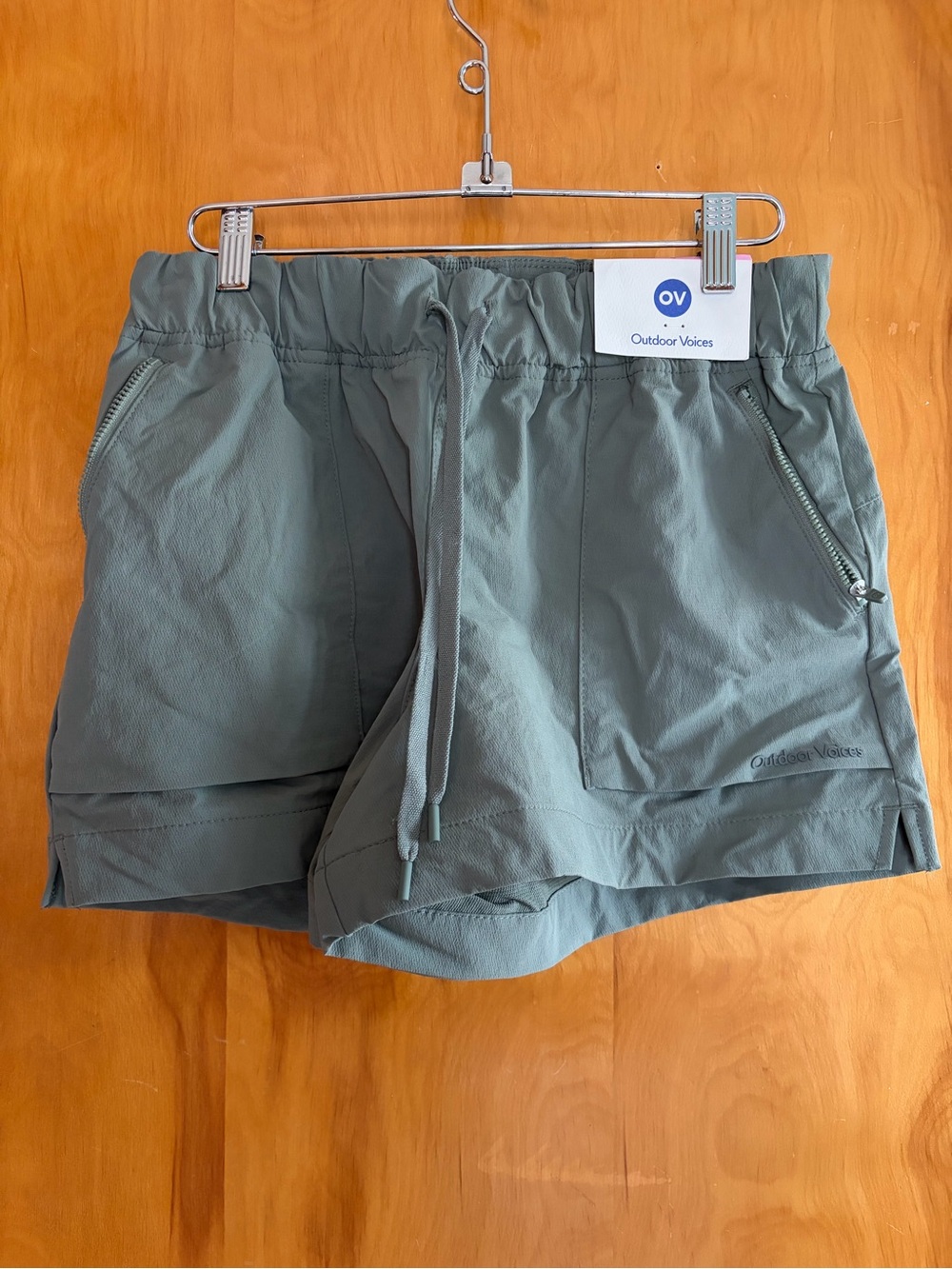 Outdoor Voices Sage Green Athletic Shorts with Zip Pockets
